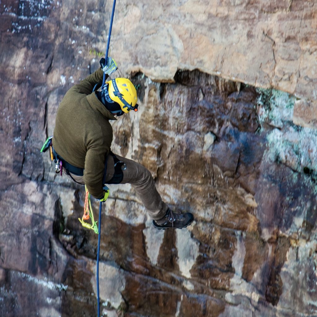 Sifu Alan Baker Repelling down a cliff in Alabama during a class 