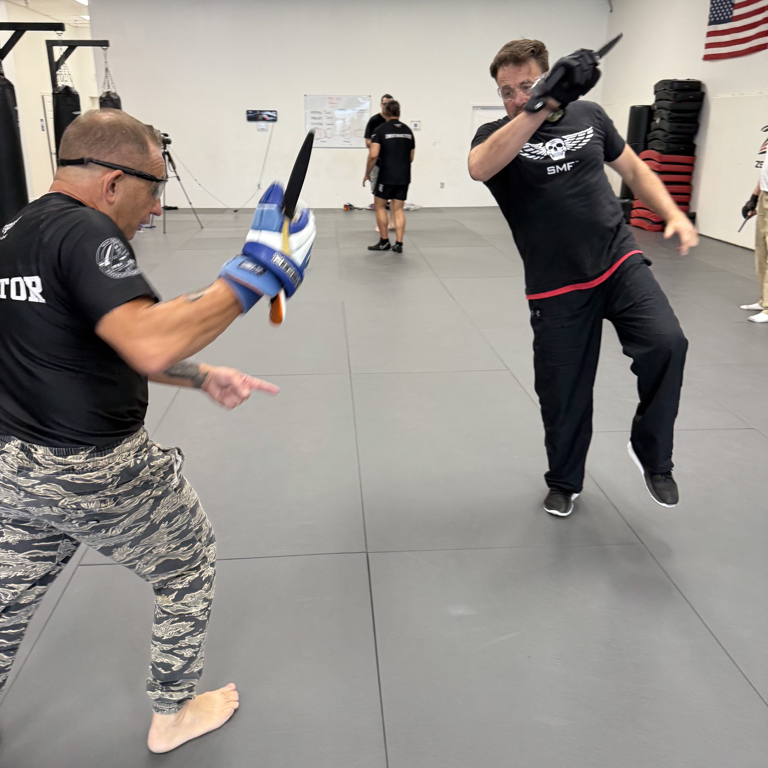 Alan Baker training an edged-weapon problem with an experienced partner