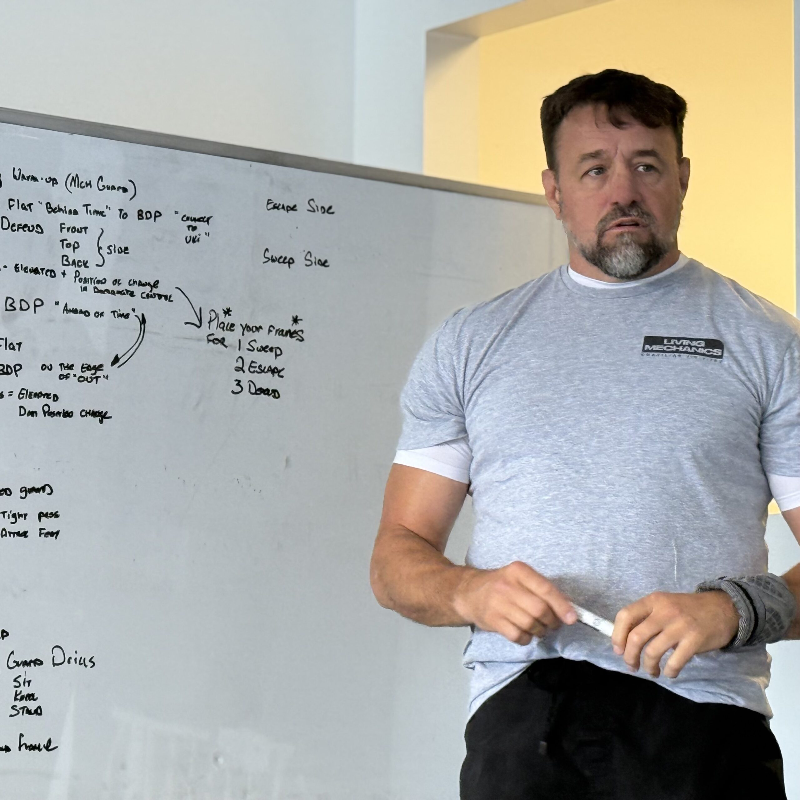 Alan Baker teaching at the whiteboard