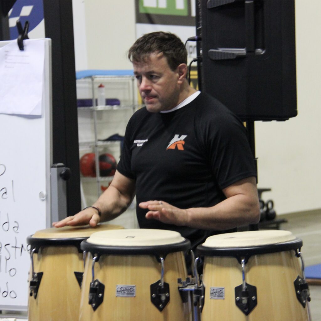 Sifu Alan Baker playing the drums in the filipino kali class at the academy 