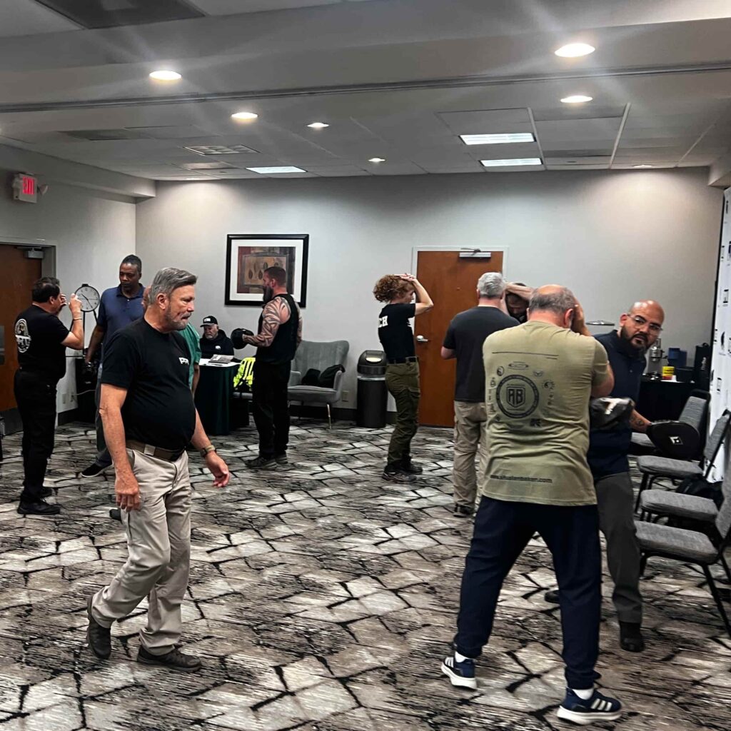 a photo of Sifu Alan Baker teaching the Protection Response Tactics program at the Executive Protection Institute