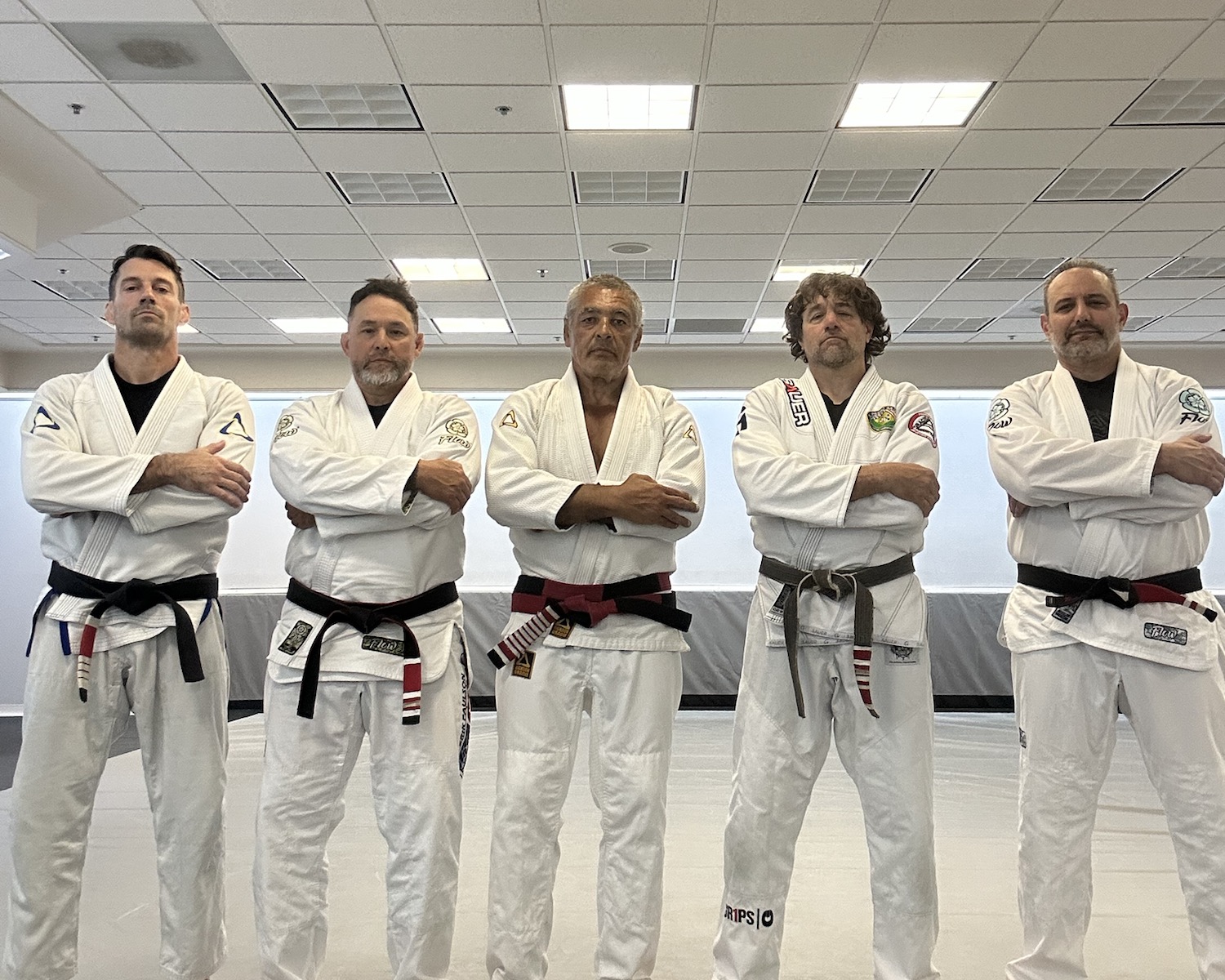 Master Rickson Gracie, Alan Baker, and fellow practitioners following the private Jiu-Jitsu training session in Vero Beach.